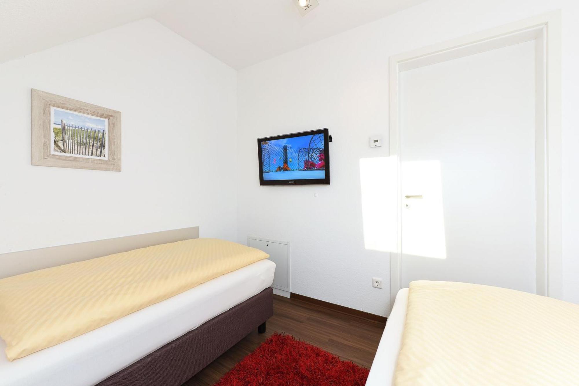 Ferienhaus Rote Bohne - Uns Huus An T Kuest Bensersiel Dış mekan fotoğraf